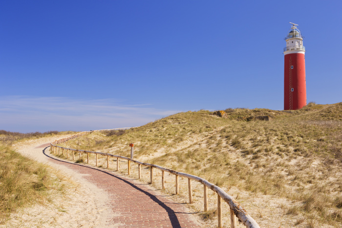 Climb the 153 steps of Texel's crimson-coloured lighthouse for views across the islands© Sara Winter / ShutterStock