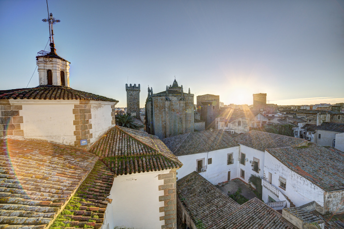 Sunset view across the rooftops of picturesque Cáceres © Luis Davilla - Getty Images