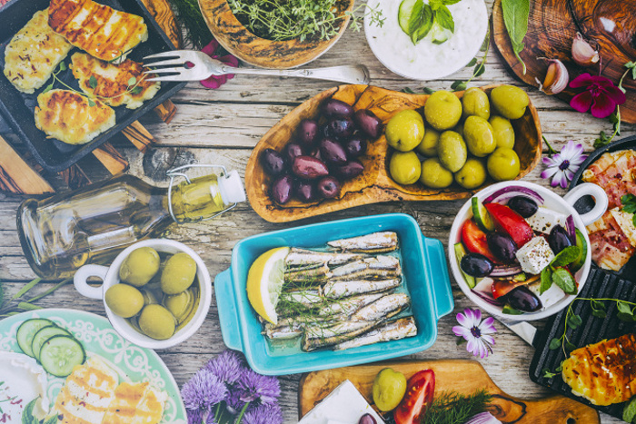 Greek dishes with mandatory olives © gorillaimages - Shutterstock