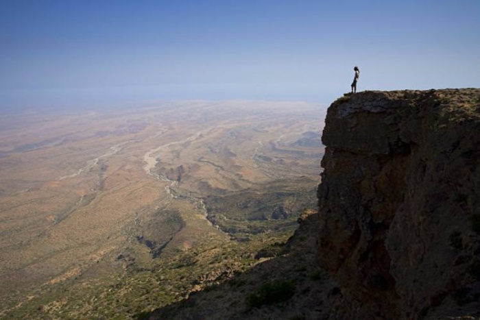 Explore otherworldly landscapes in Oman. © Sylvain Dussans / Getty Images.jpg